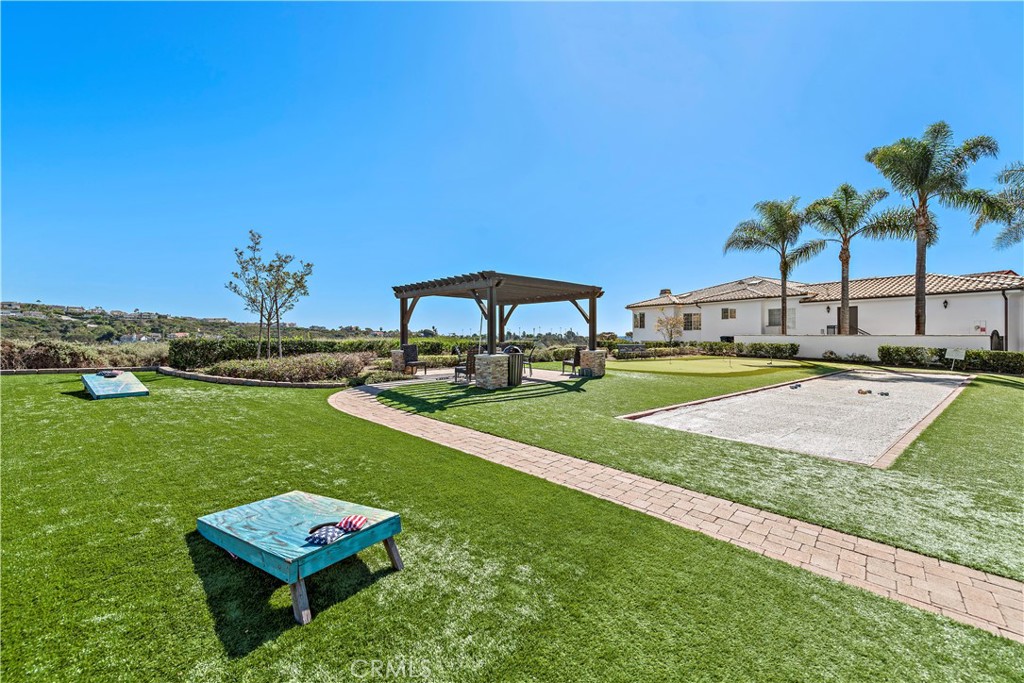 4 Via Goleta San Clemente, CA 92673 - Photo 69 of 70 a view of a garden with a bench in the patio