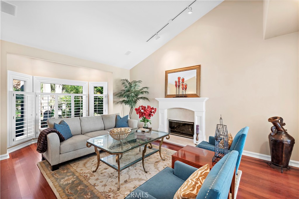 4 Via Goleta San Clemente, CA 92673 - Photo 10 of 70 a living room with furniture fireplace and wooden floor