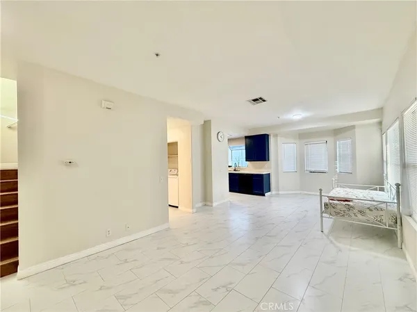 a view of a livingroom with furniture and fireplace