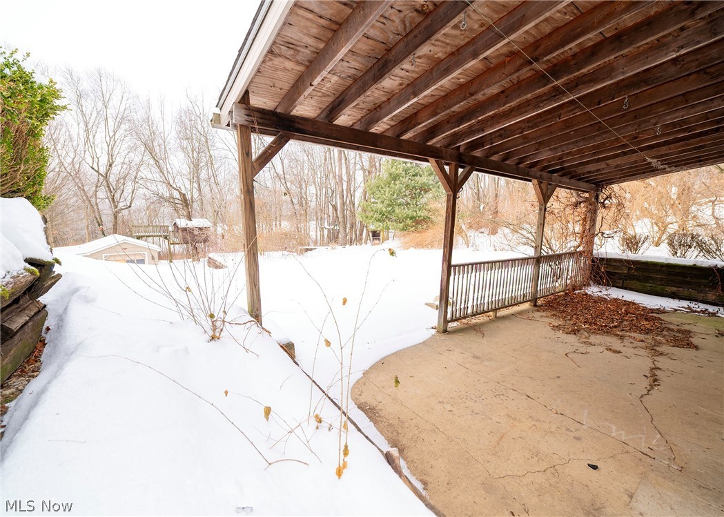 861 Cherry Road Northwest Massillon, OH 44647 - Photo 4 of 25 Back view of home with yard area and porch