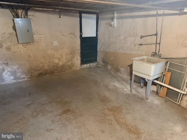 a bathroom with a sink and a shower
