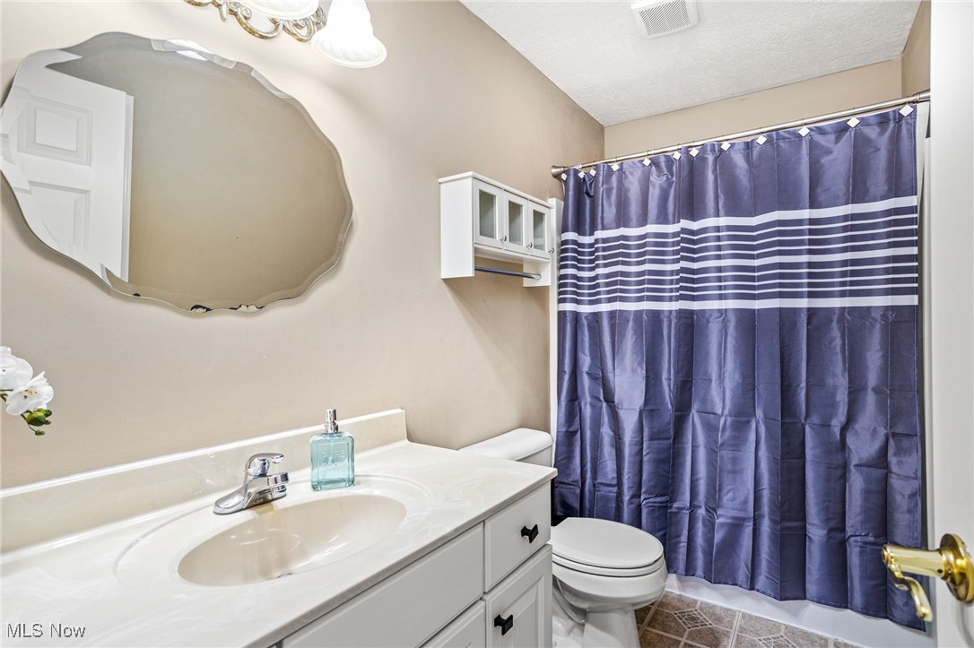 11620 Friendsville Road Creston, OH 44217 - Photo 32 of 40 Upstairs Bathroom featuring vanity and shower
