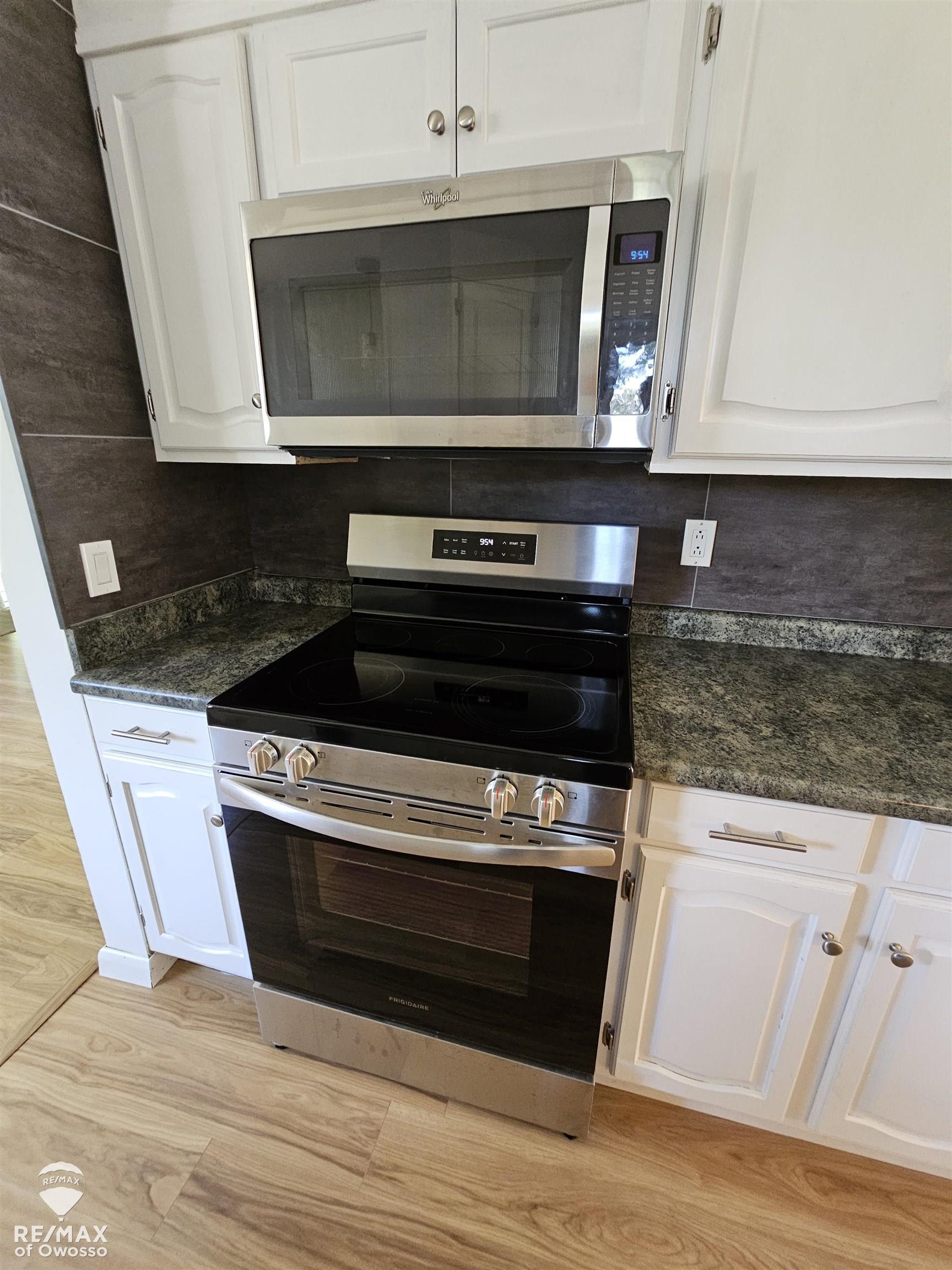 1516 North Hickory Road Owosso, MI 48867 - Photo 5 of 26 view of the new Range Oven & Microwave