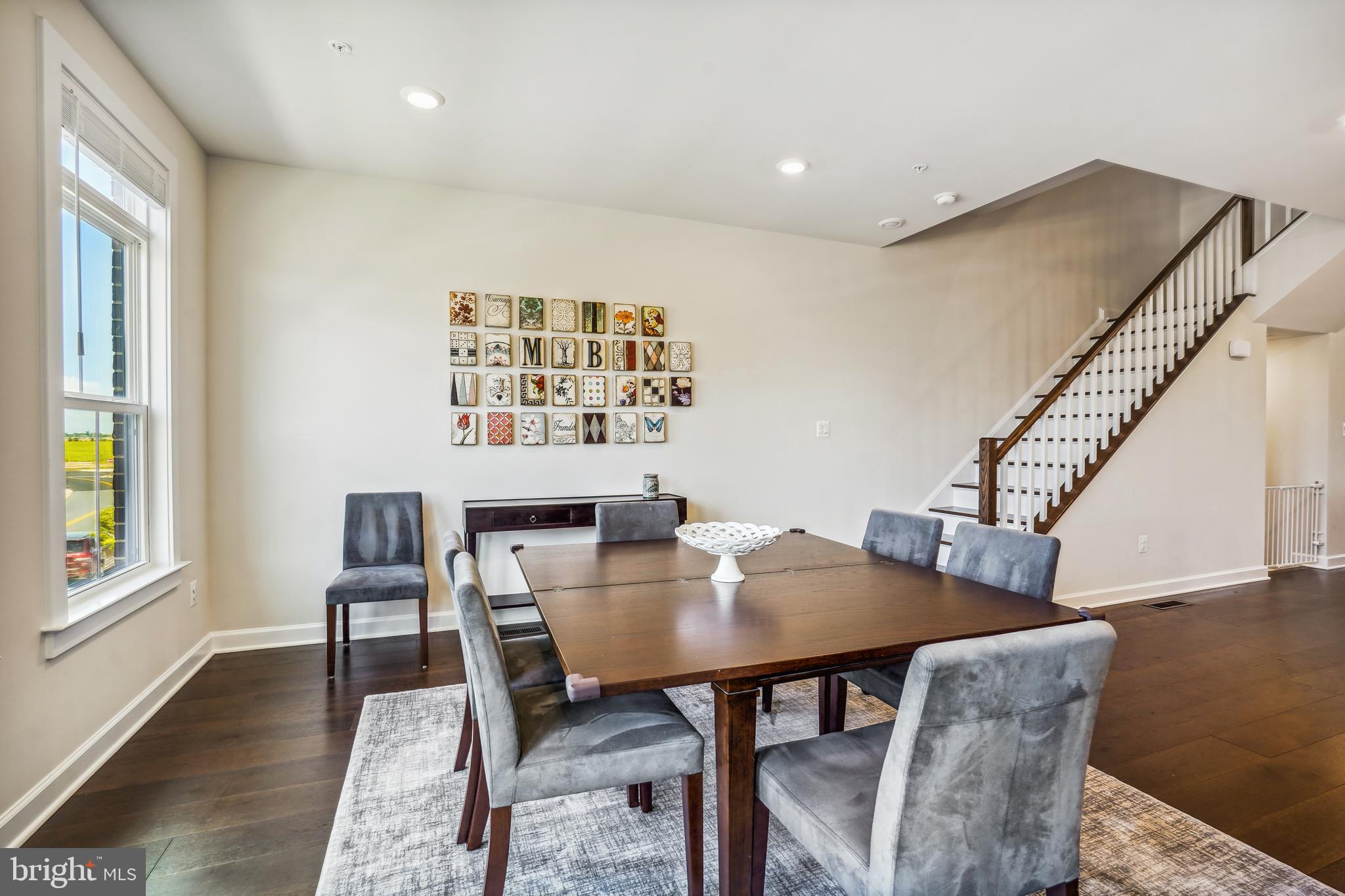 43469 Grandmoore Street Ashburn, VA 20148 - Photo 11 of 62 a view of a dining room with furniture and a window