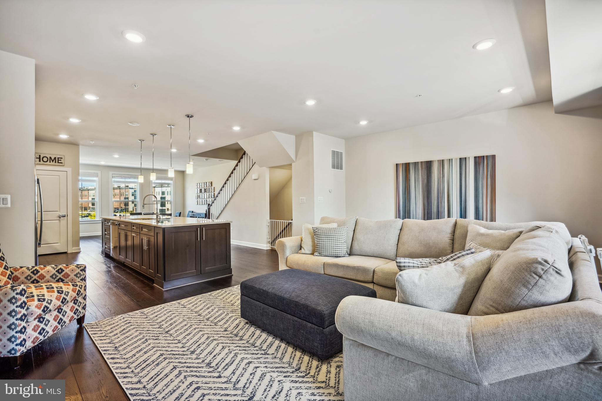 43469 Grandmoore Street Ashburn, VA 20148 - Photo 19 of 62 a living room with furniture and a wooden floor