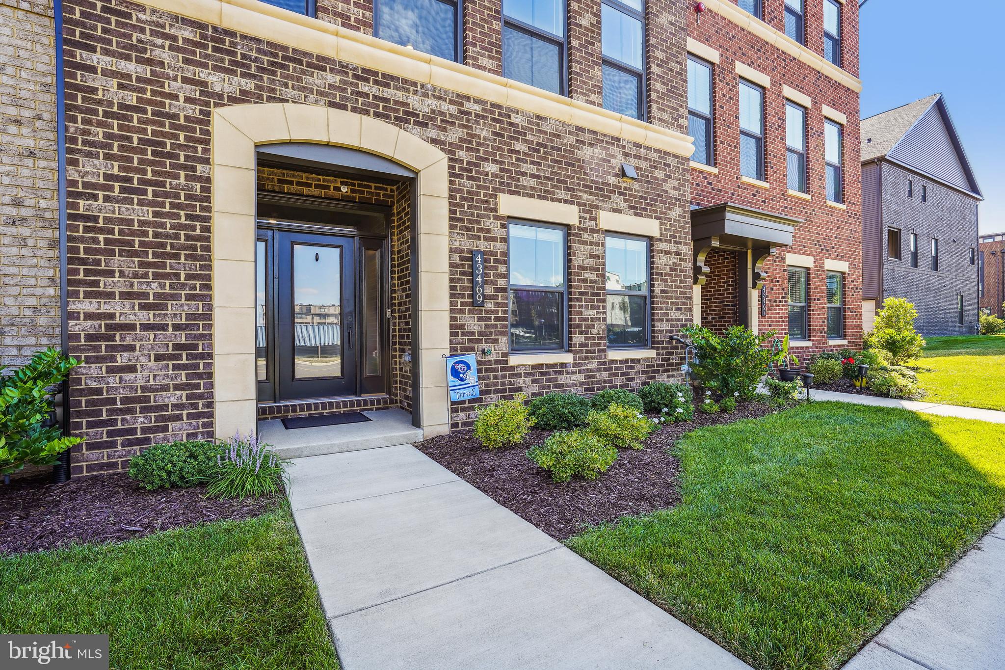 43469 Grandmoore Street Ashburn, VA 20148 - Photo 2 of 62 a view of a building with garden