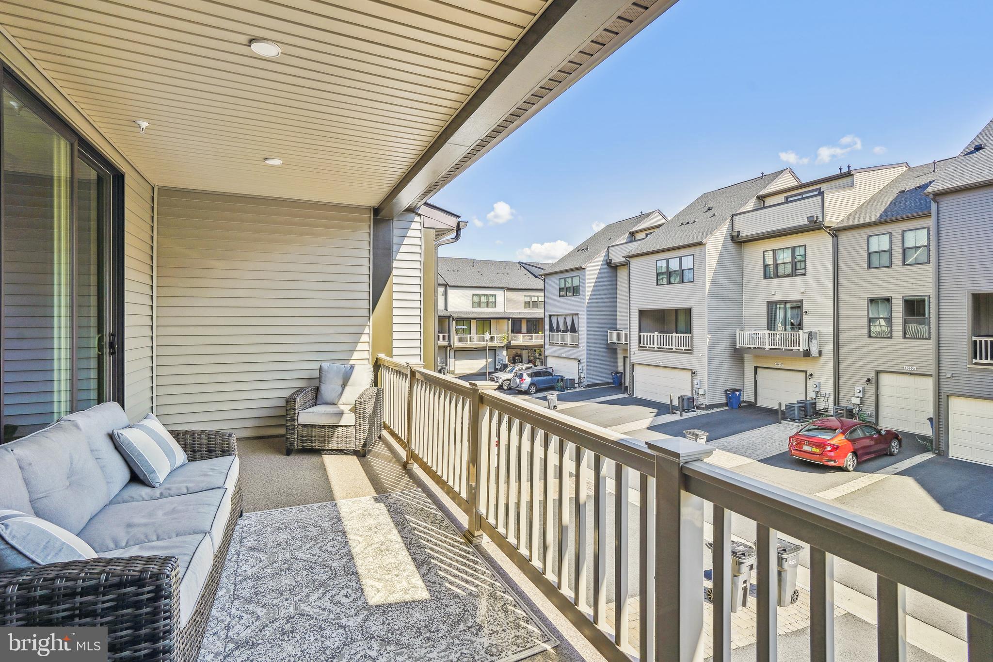 43469 Grandmoore Street Ashburn, VA 20148 - Photo 23 of 62 a view of a porch with furniture