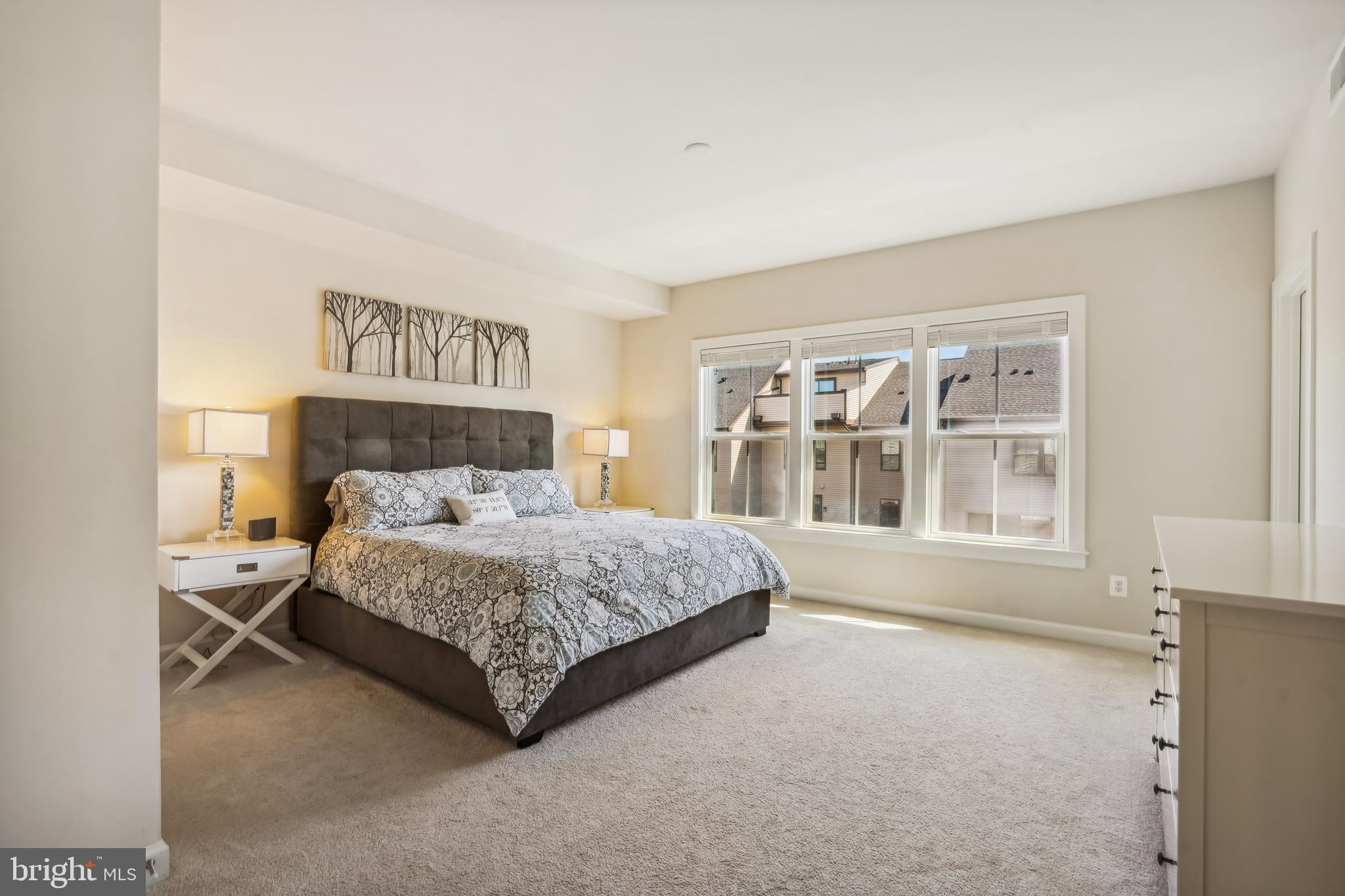 43469 Grandmoore Street Ashburn, VA 20148 - Photo 25 of 62 a bedroom with a bed and a large window