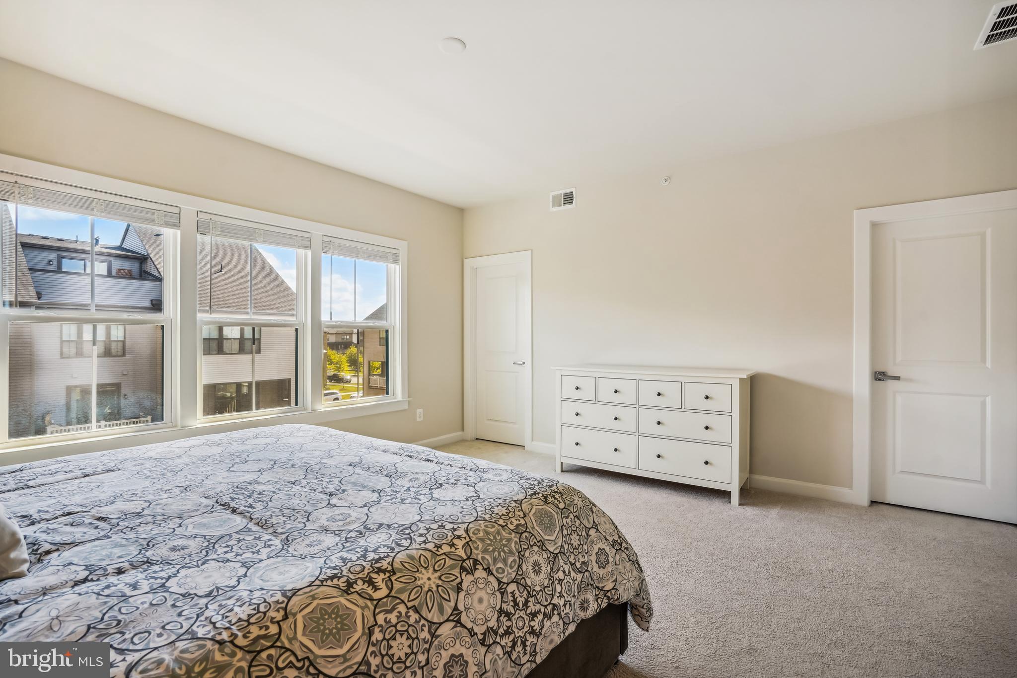 43469 Grandmoore Street Ashburn, VA 20148 - Photo 27 of 62 a bedroom with a bed and a window