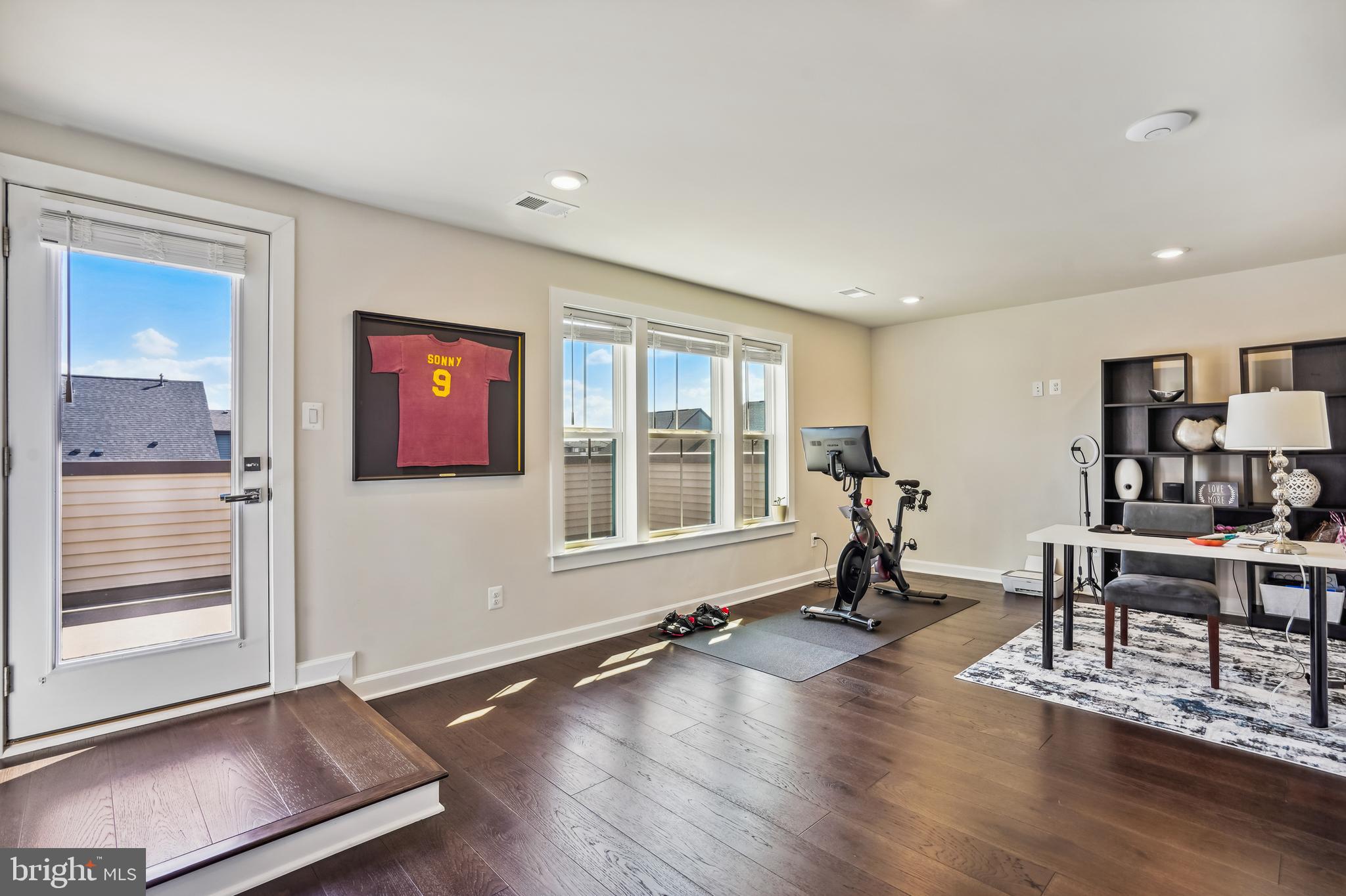 43469 Grandmoore Street Ashburn, VA 20148 - Photo 40 of 62 a living room with furniture window and wooden floor