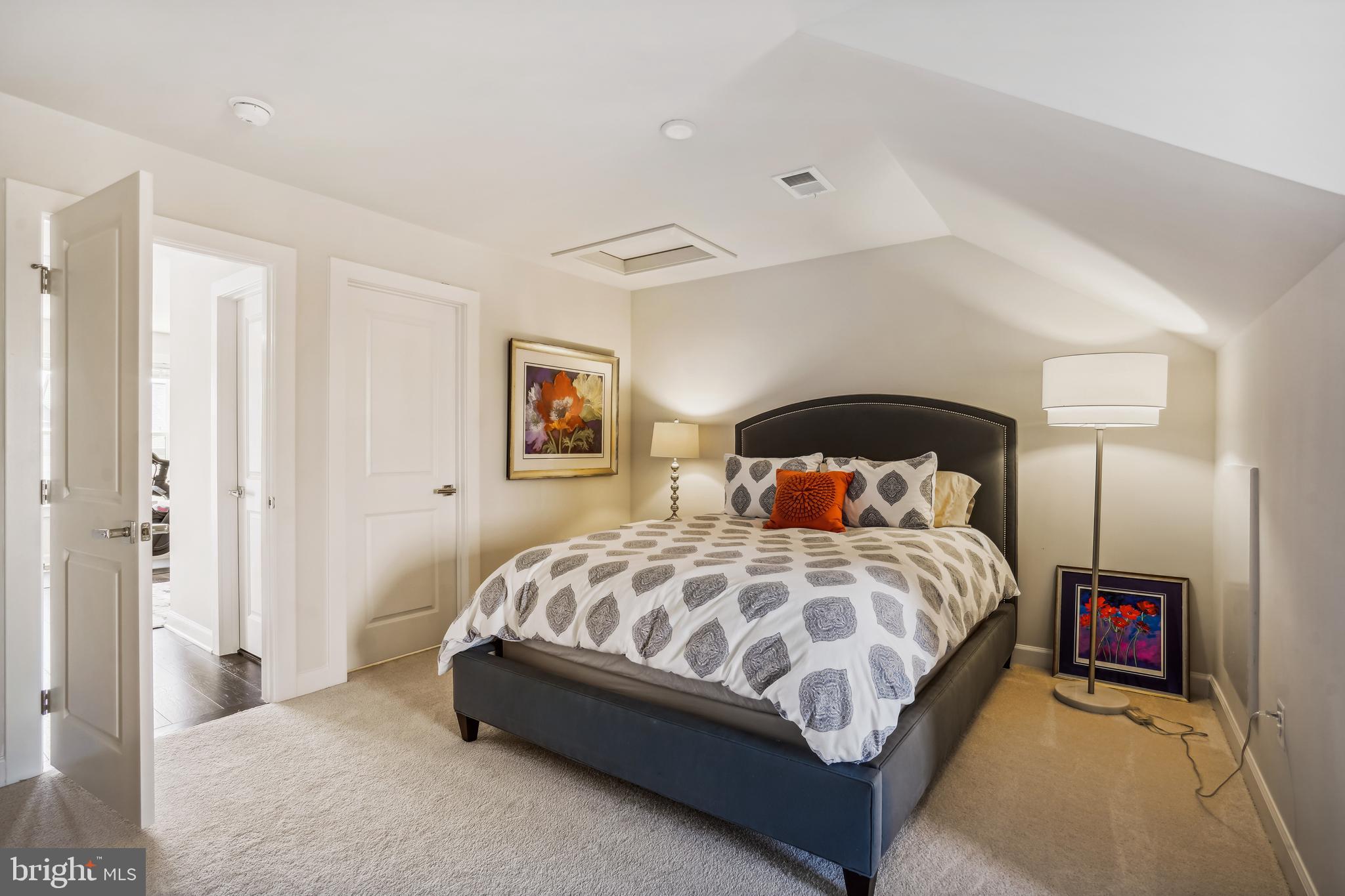43469 Grandmoore Street Ashburn, VA 20148 - Photo 44 of 62 a bedroom with a bed and a painting