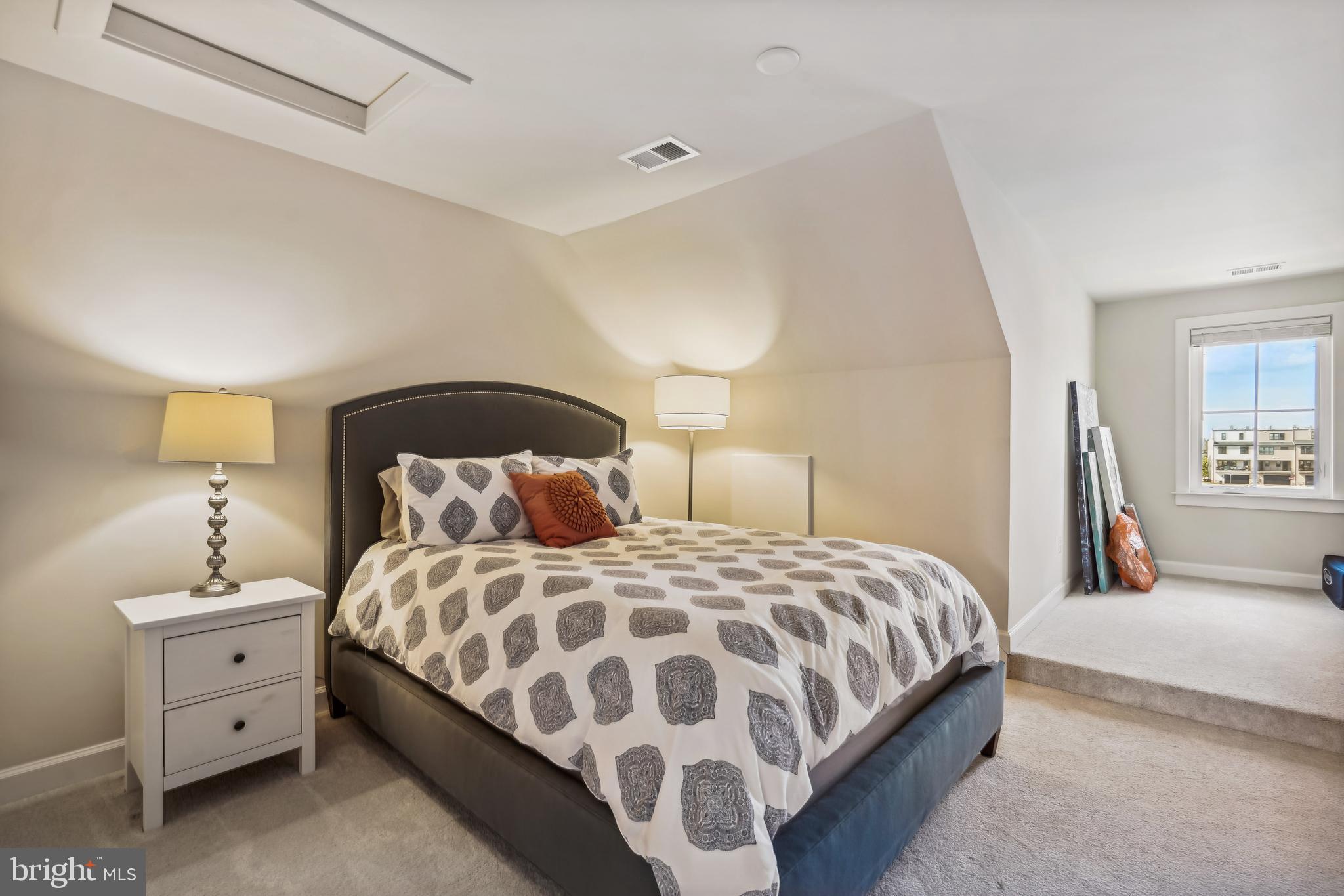 43469 Grandmoore Street Ashburn, VA 20148 - Photo 45 of 62 a bedroom with a bed and window