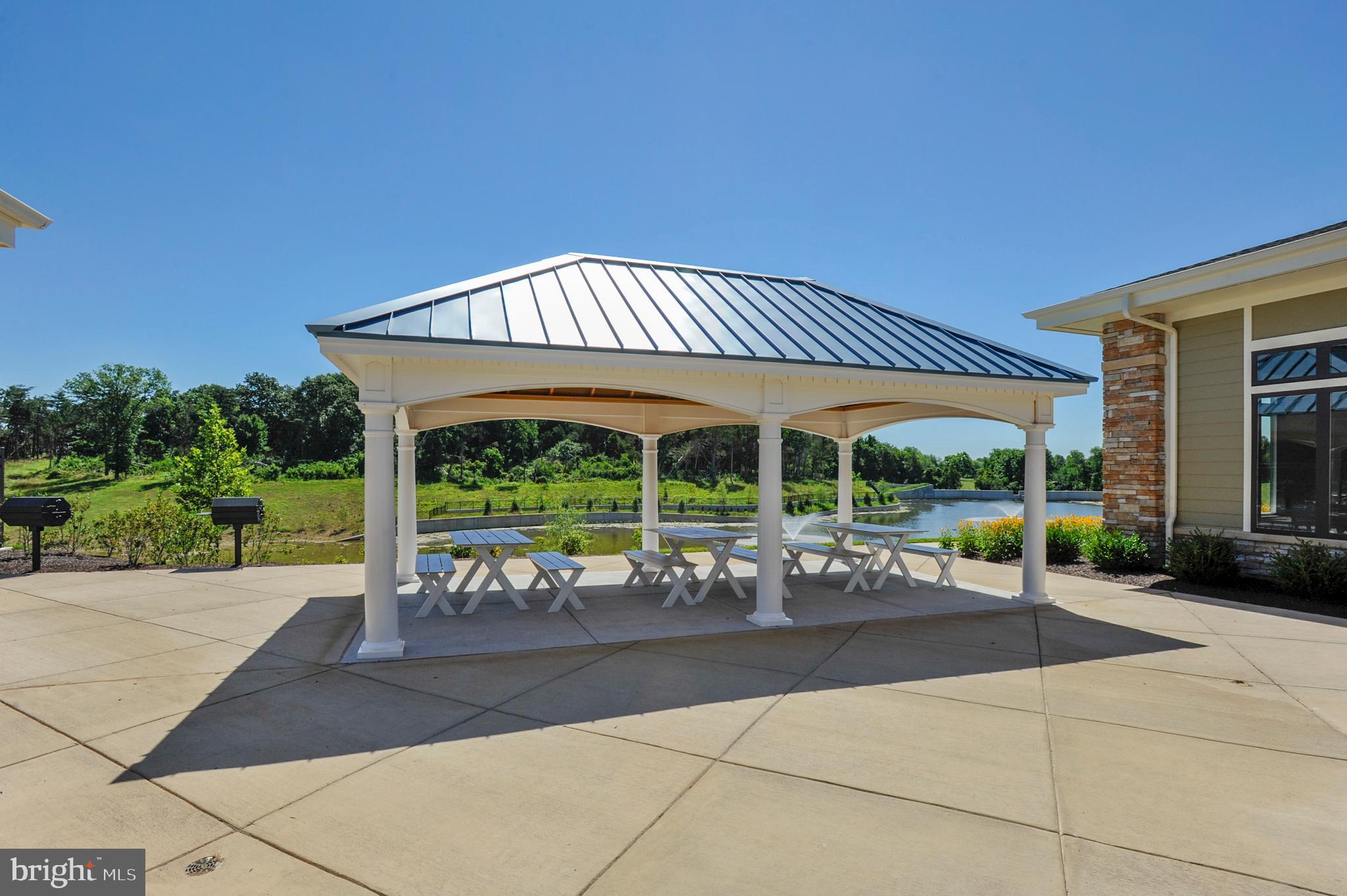 43469 Grandmoore Street Ashburn, VA 20148 - Photo 51 of 62 a view of a patio with a table and chairs