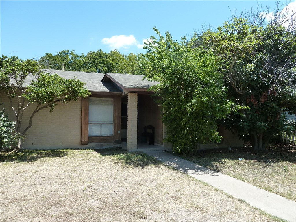 10815 Lambert Circle Austin, TX 78758 - Photo 1 of 1 a front view of a house with a yard