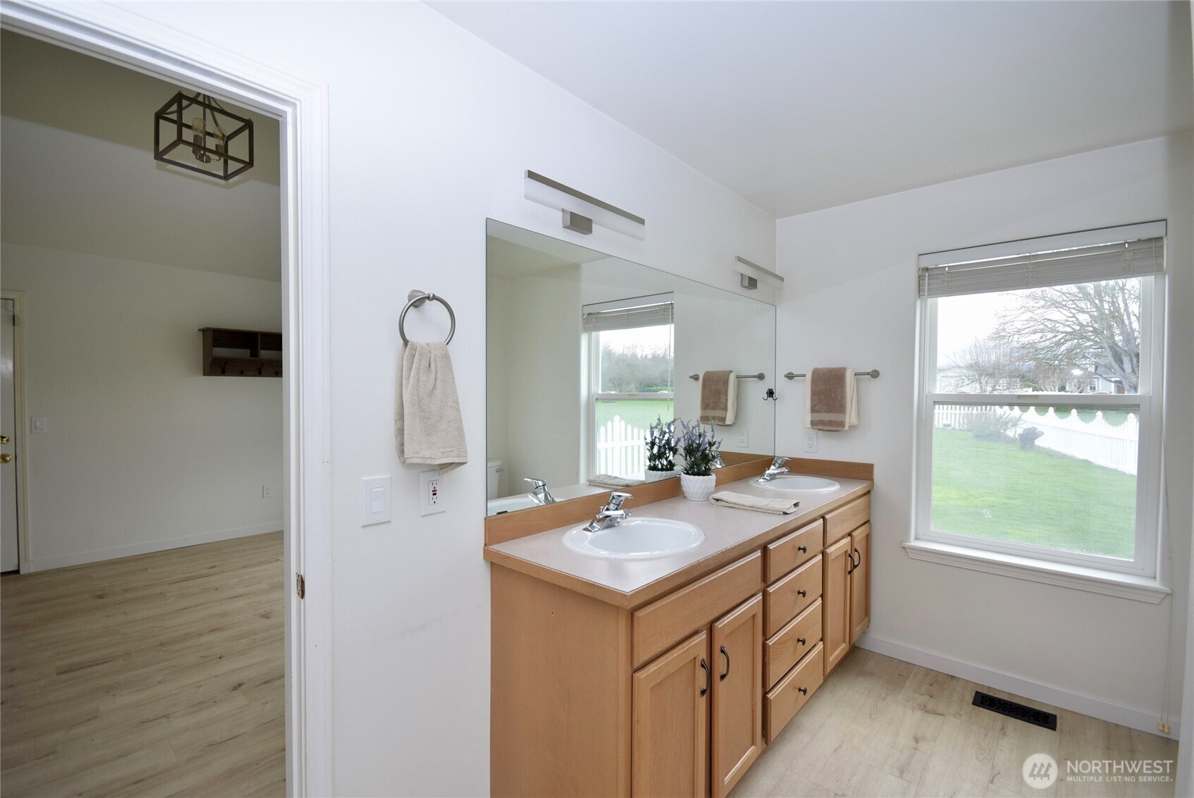 71 John Carl Road Sequim, WA 98382 - Photo 19 of 37 a bathroom with a sink a vanity and a mirror