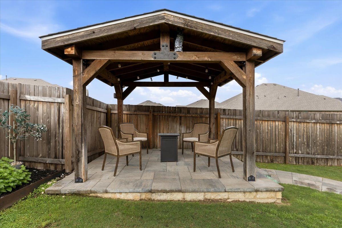 1029 Wild Pecan Loop Buda, TX 78610 - Photo 30 of 37 a view of deck with patio