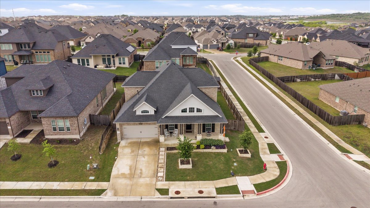 1029 Wild Pecan Loop Buda, TX 78610 - Photo 3 of 37 an aerial view of a house