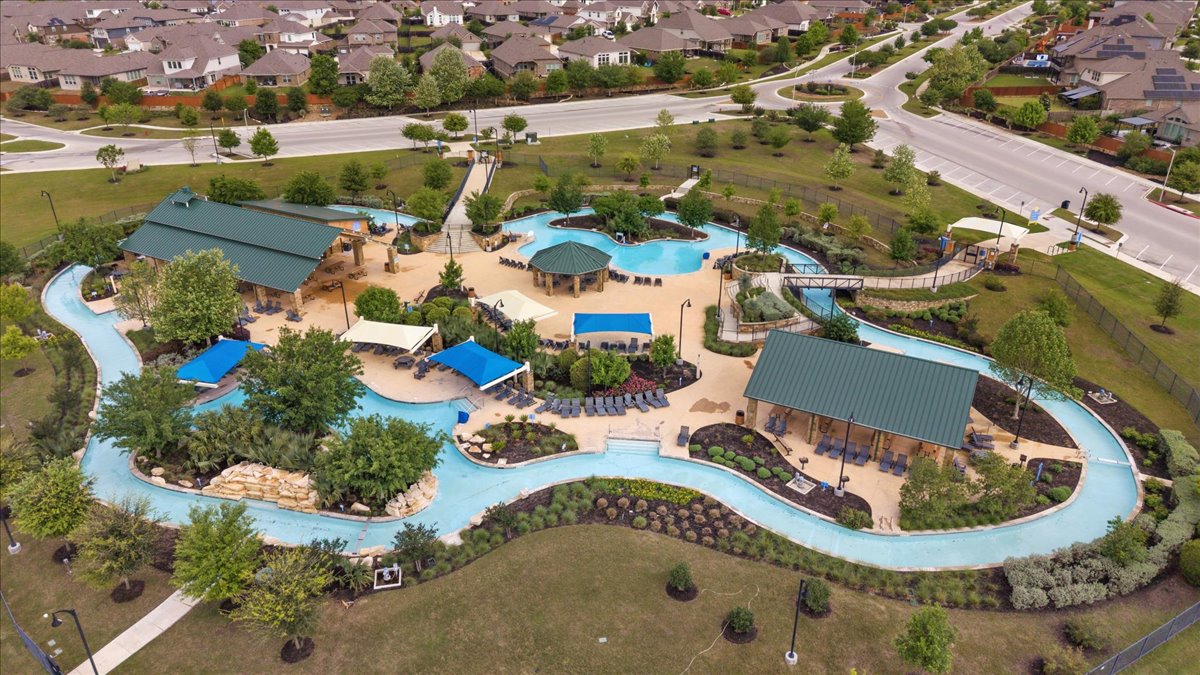 1029 Wild Pecan Loop Buda, TX 78610 - Photo 34 of 37 an aerial view of a house with a swimming pool