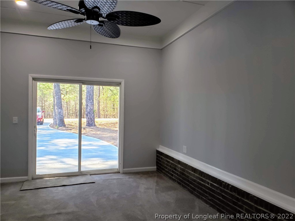 711 Reservation Road Aberdeen, NC 28315 - Photo 9 of 19 an empty room with a window
