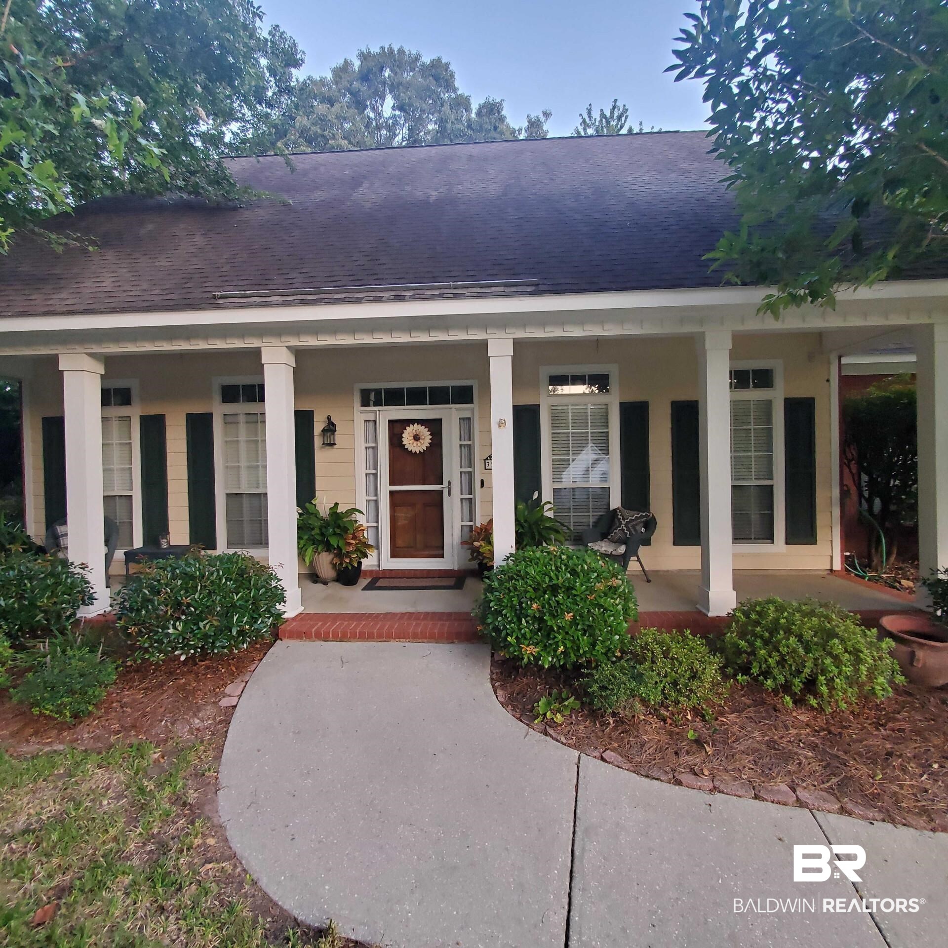 31163 Woodland Way Daphne, AL 36527 - Photo 3 of 44 View of front of home with a porch