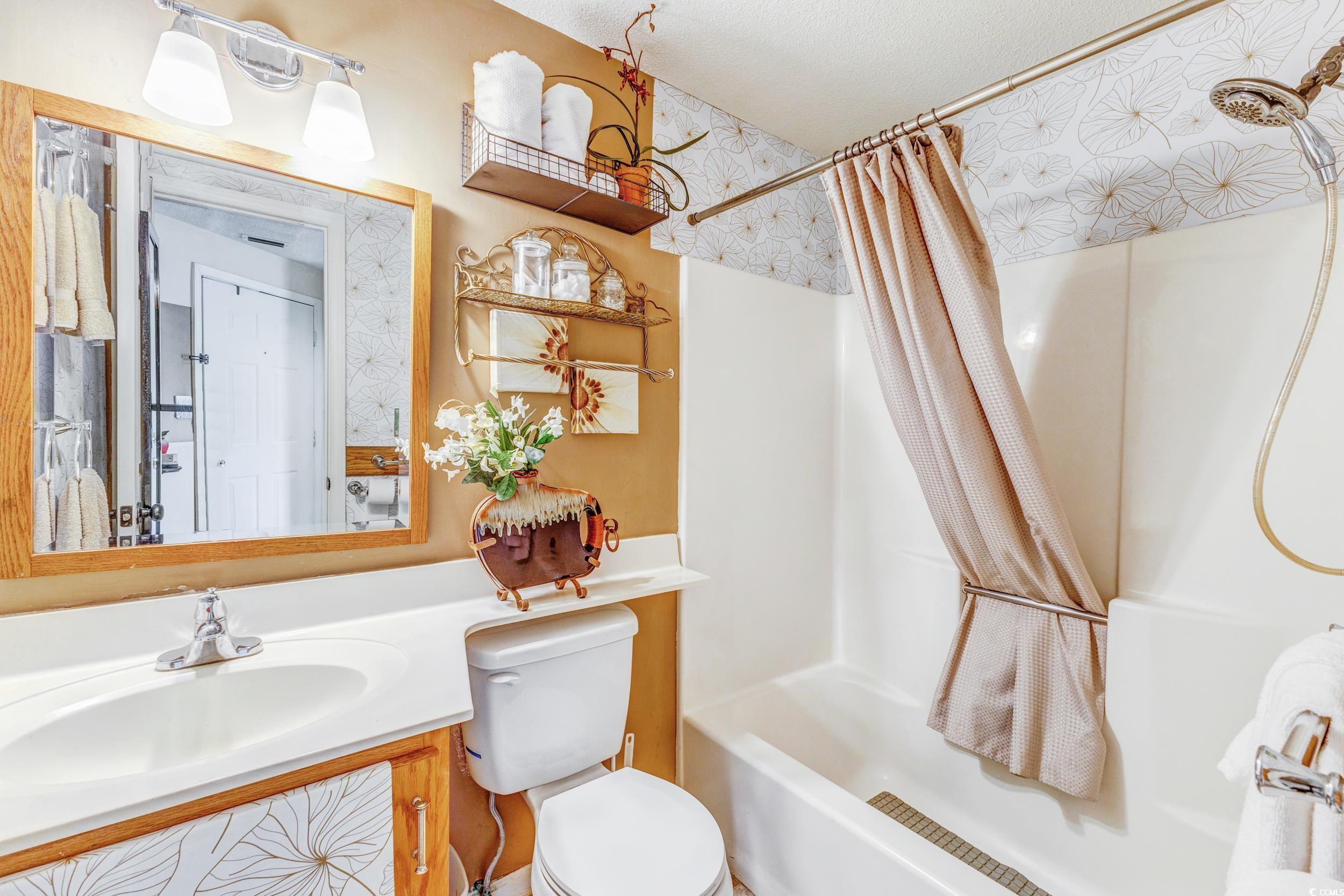 1100 Possum Trot Road, Unit G326 North Myrtle Beach, SC 29582 - Photo 12 of 21 Full bath featuring shower / bath combo and vanity