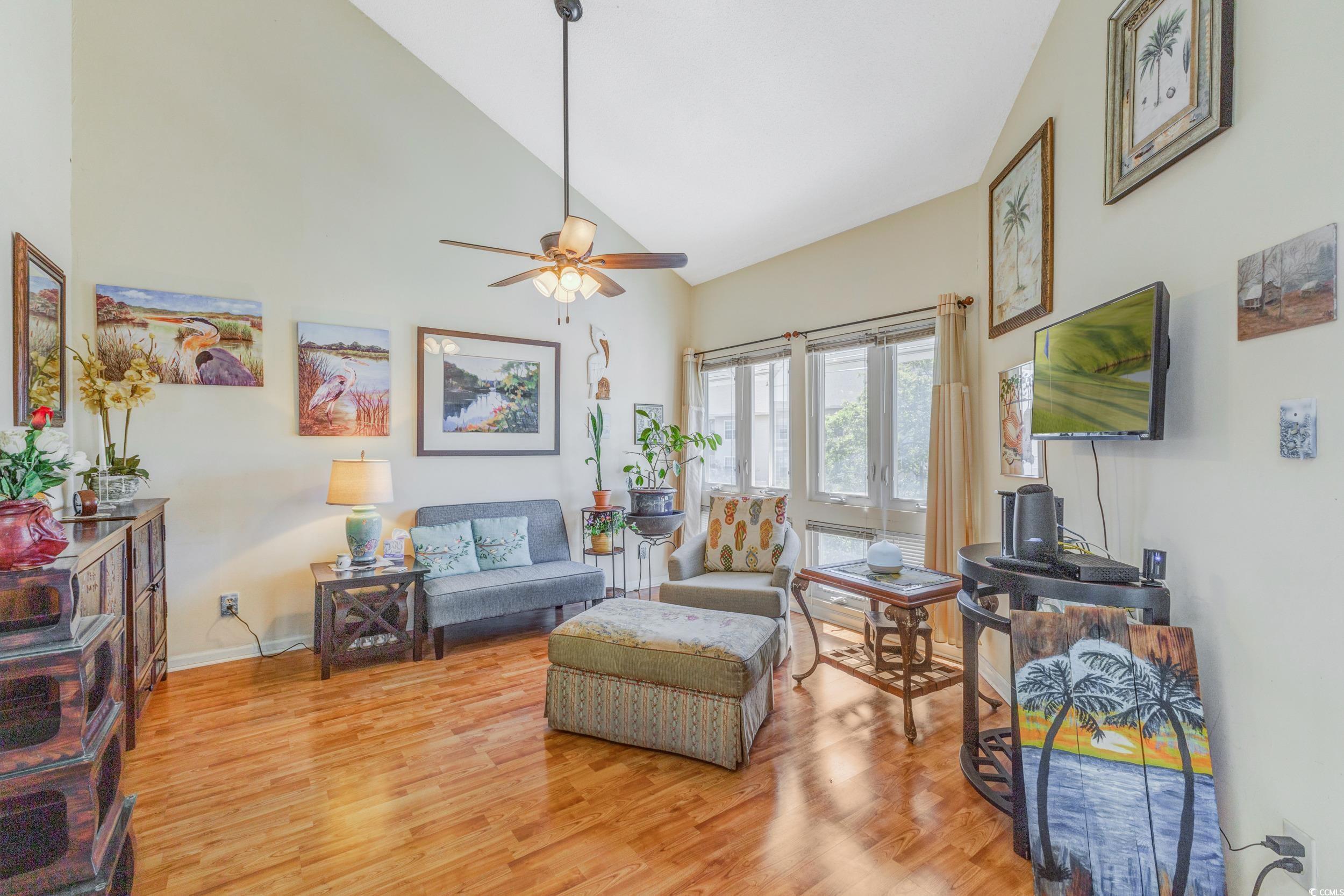 1100 Possum Trot Road, Unit G326 North Myrtle Beach, SC 29582 - Photo 14 of 21 Living room with high vaulted ceiling, light wood-style flooring, and ceiling fan