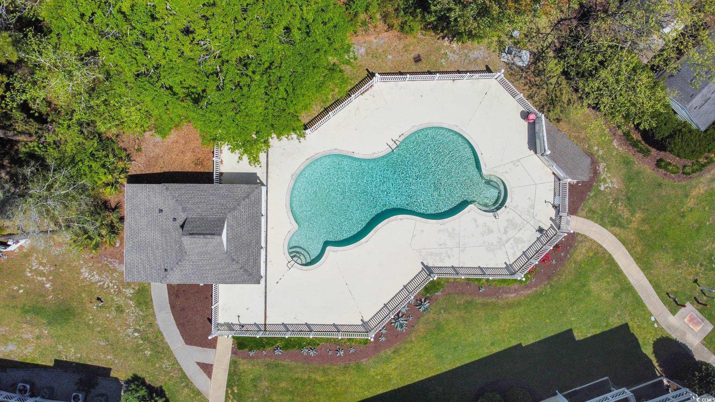1100 Possum Trot Road, Unit G326 North Myrtle Beach, SC 29582 - Photo 17 of 21 Aerial view of a pool