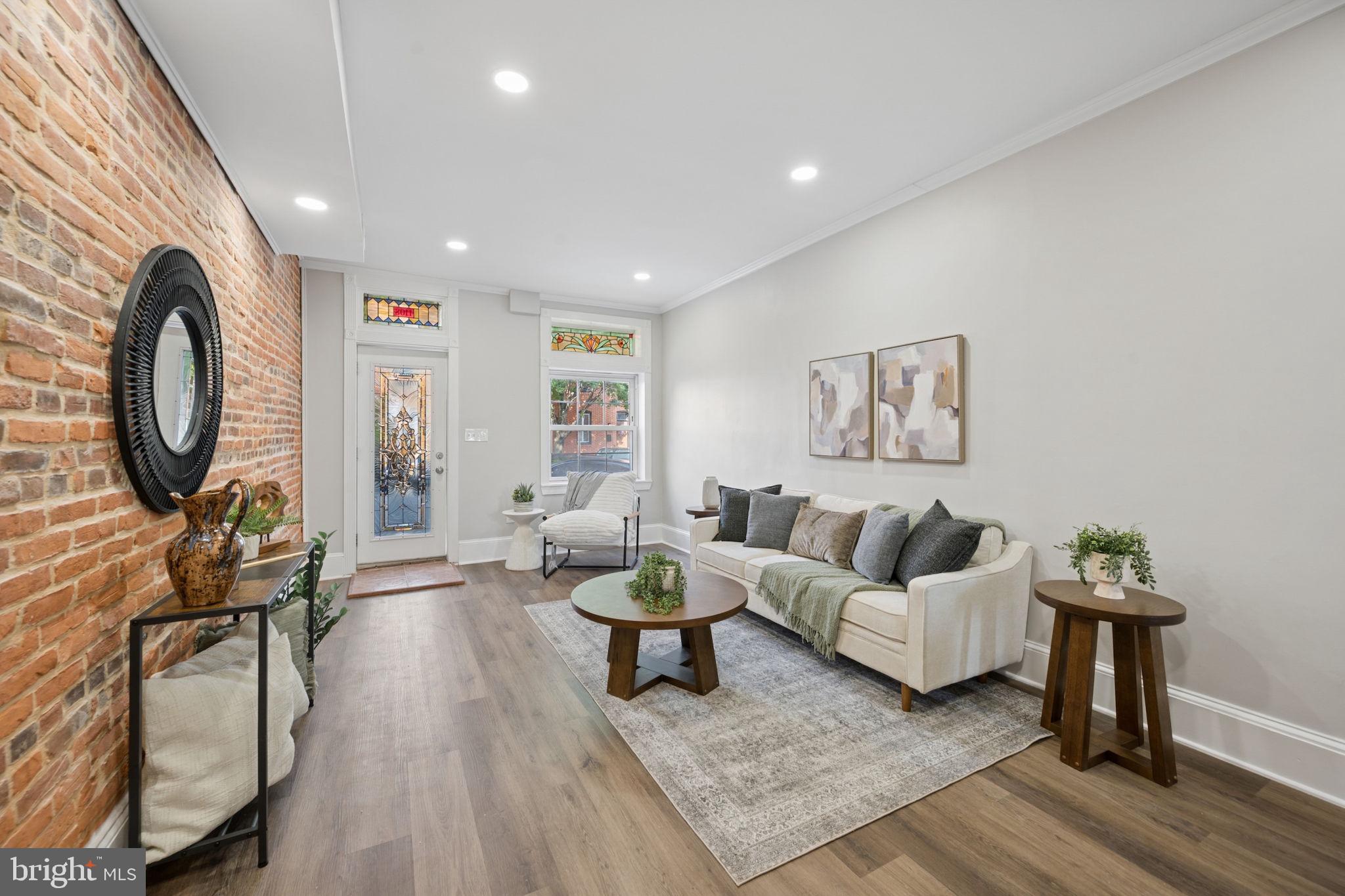 1108 South Clinton Street Baltimore, MD 21224 - Photo 3 of 66 Charming urban retreat with exposed brick.