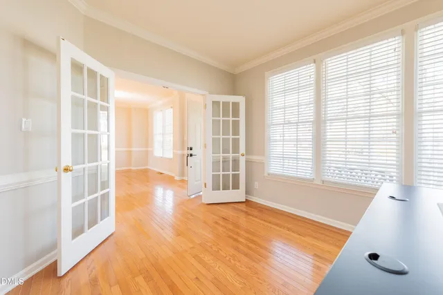 a view of an empty room with a window
