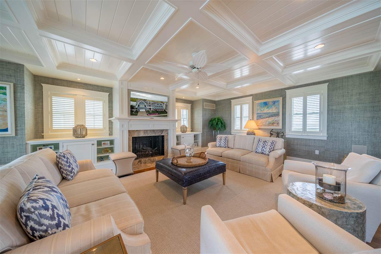 498 7th Street Avalon, NJ 08202 - Photo 13 of 36 a living room with furniture fireplace and a large window
