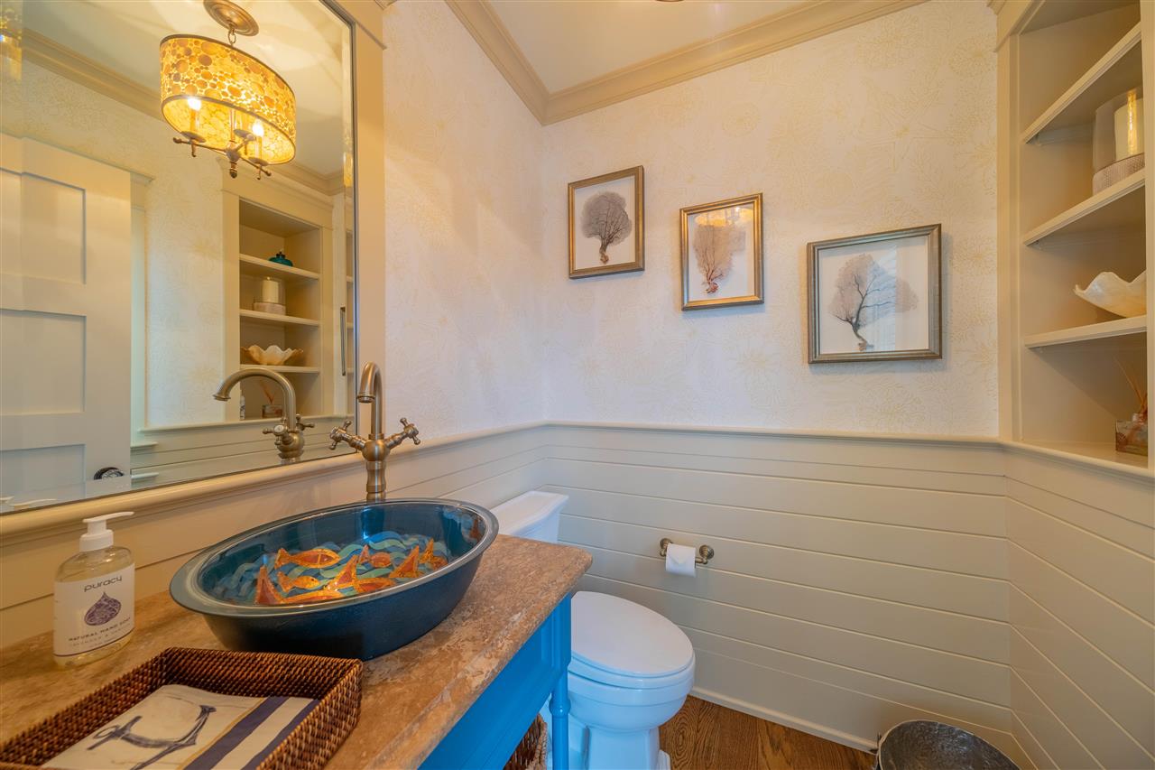 498 7th Street Avalon, NJ 08202 - Photo 19 of 36 a bathroom with a toilet and a sink