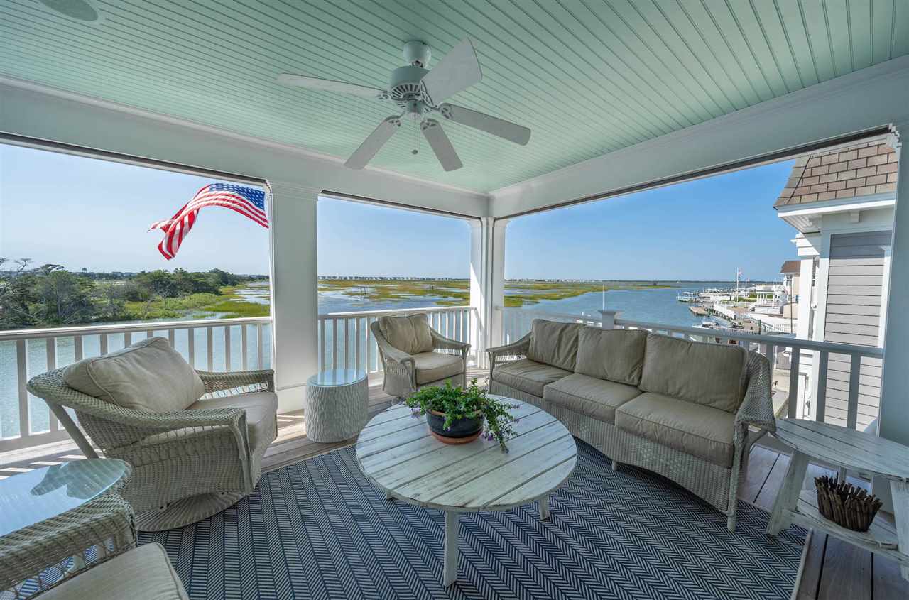 498 7th Street Avalon, NJ 08202 - Photo 30 of 36 a living room with furniture and a large window