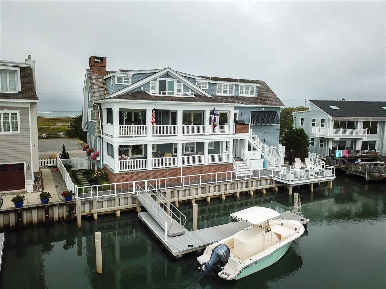 498 7th Street Avalon, NJ 08202 - Photo 32 of 36 a front view of a house with a boat