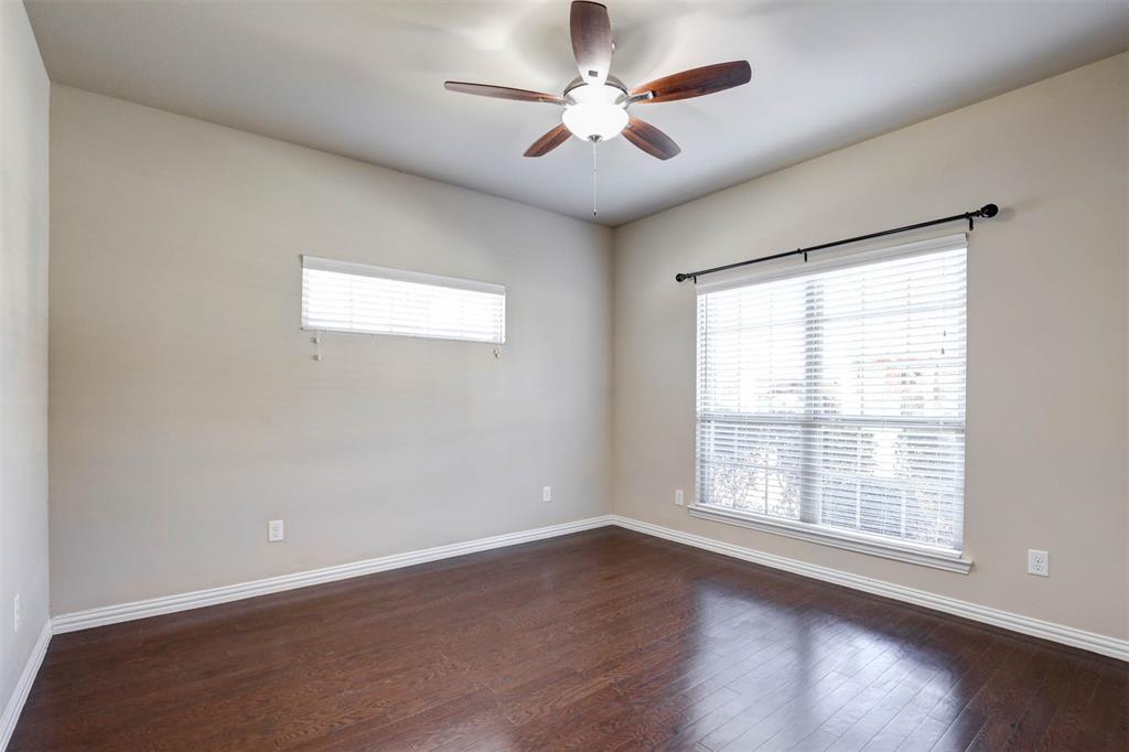 5633 Hummingbird Lane Fairview, TX 75069 - Photo 20 of 25 wooden floor in an empty room with a window