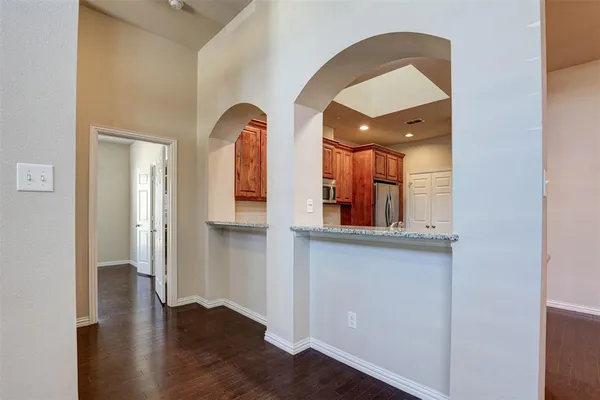 a view of entryway with wooden floor
