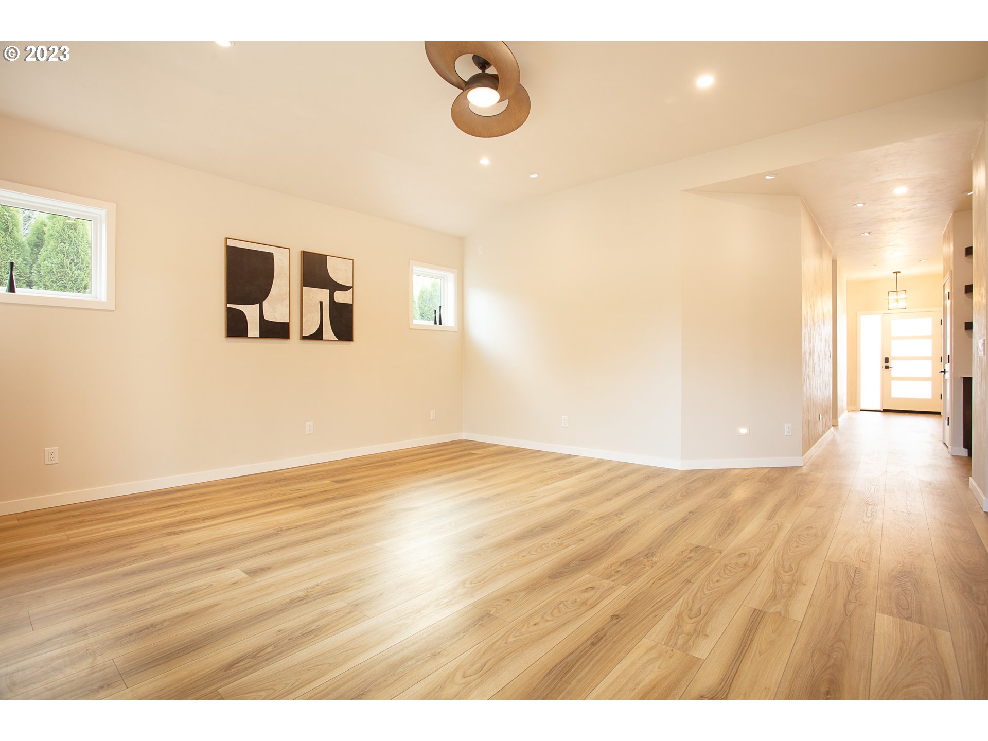 806 Salmonberry Street Springfield, OR 97477 - Photo 13 of 31 a view of empty room with wooden floor