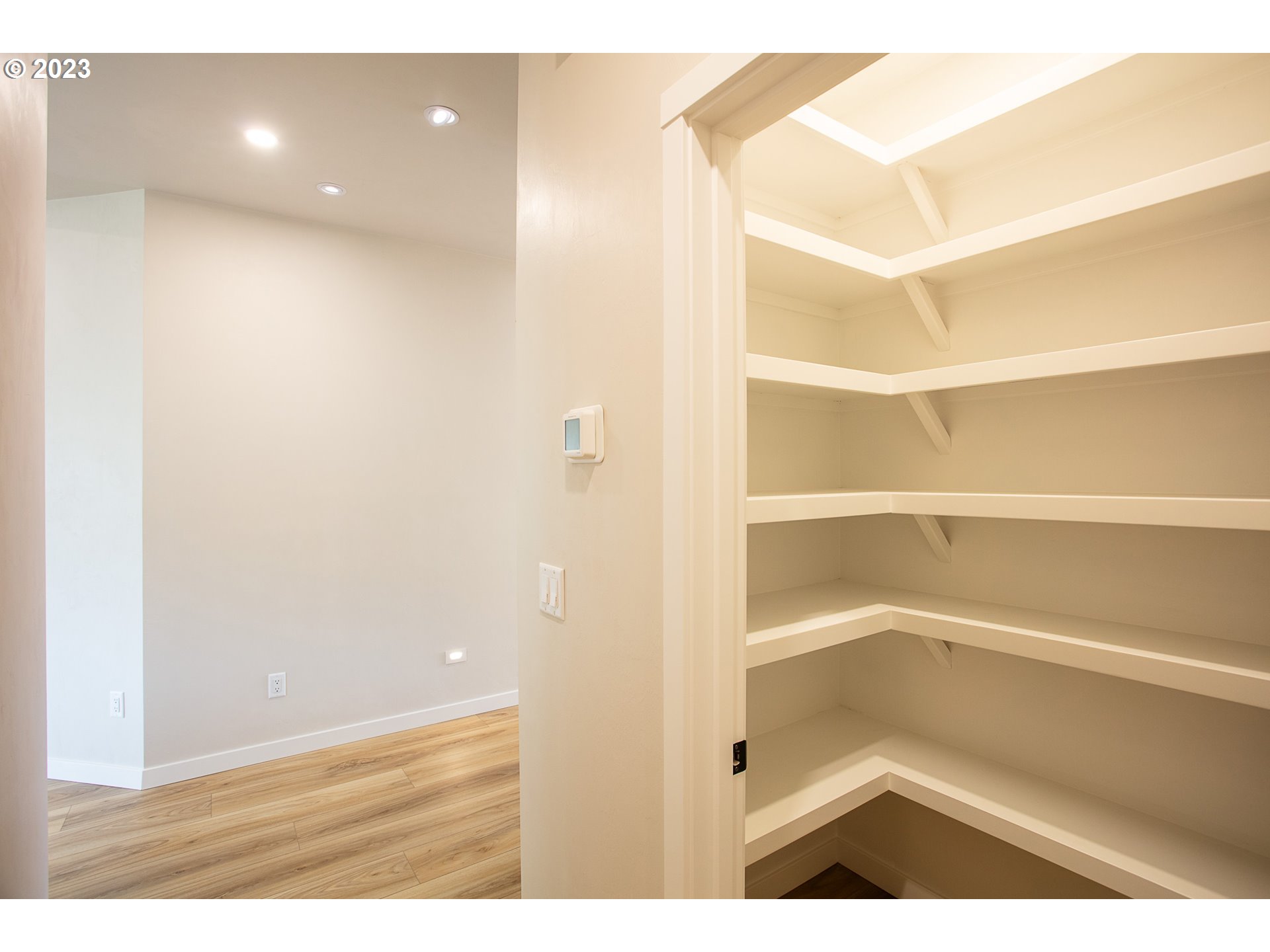 806 Salmonberry Street Springfield, OR 97477 - Photo 18 of 31 a view of a room with shelves