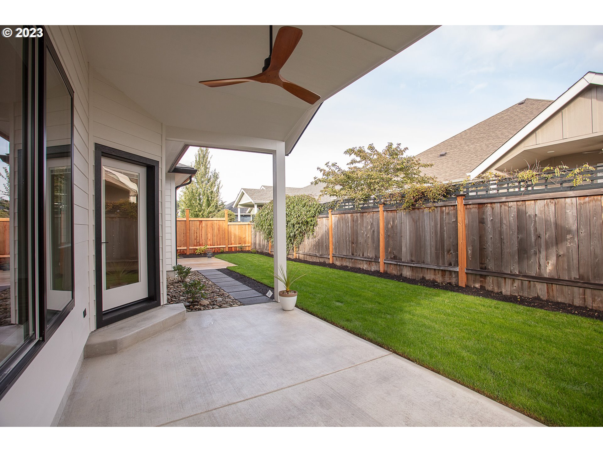 806 Salmonberry Street Springfield, OR 97477 - Photo 25 of 31 a view of a porch with a yard