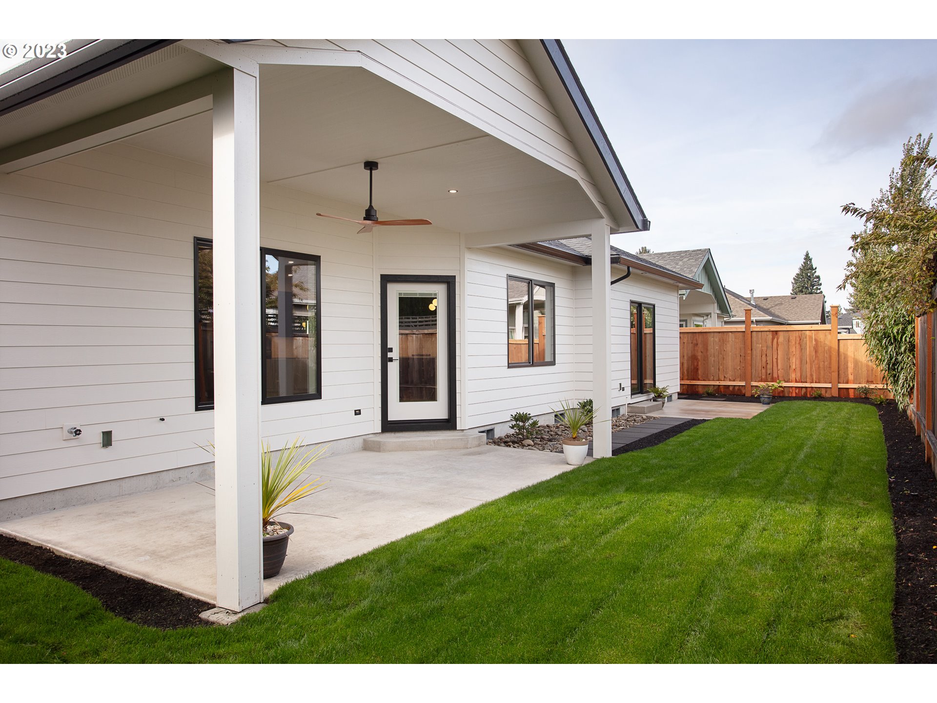 806 Salmonberry Street Springfield, OR 97477 - Photo 26 of 31 a view of a backyard with a garden