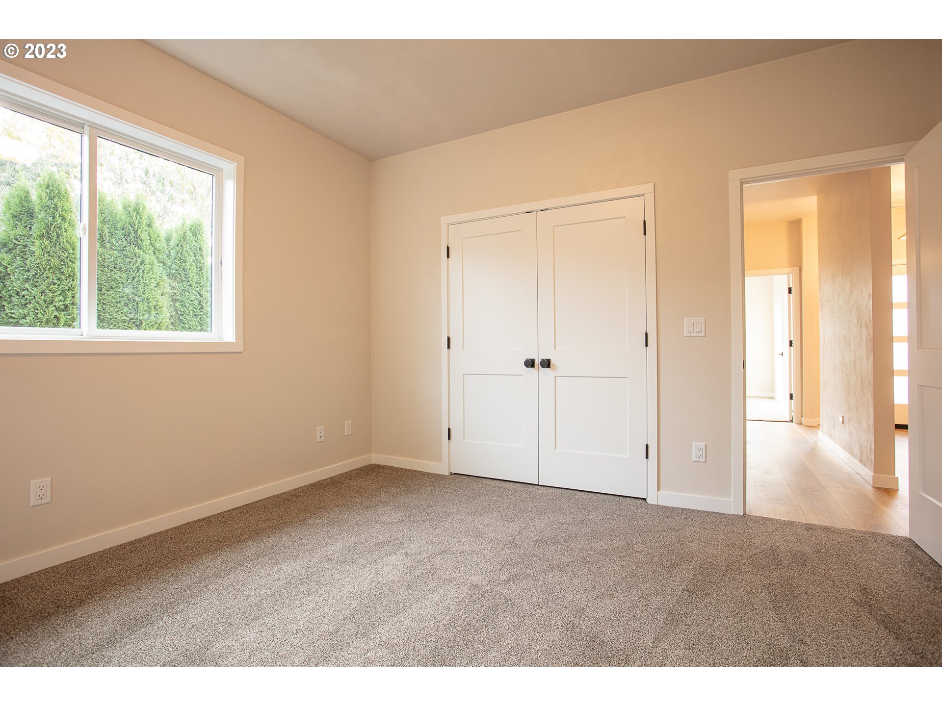 806 Salmonberry Street Springfield, OR 97477 - Photo 9 of 31 a view of an empty room and window