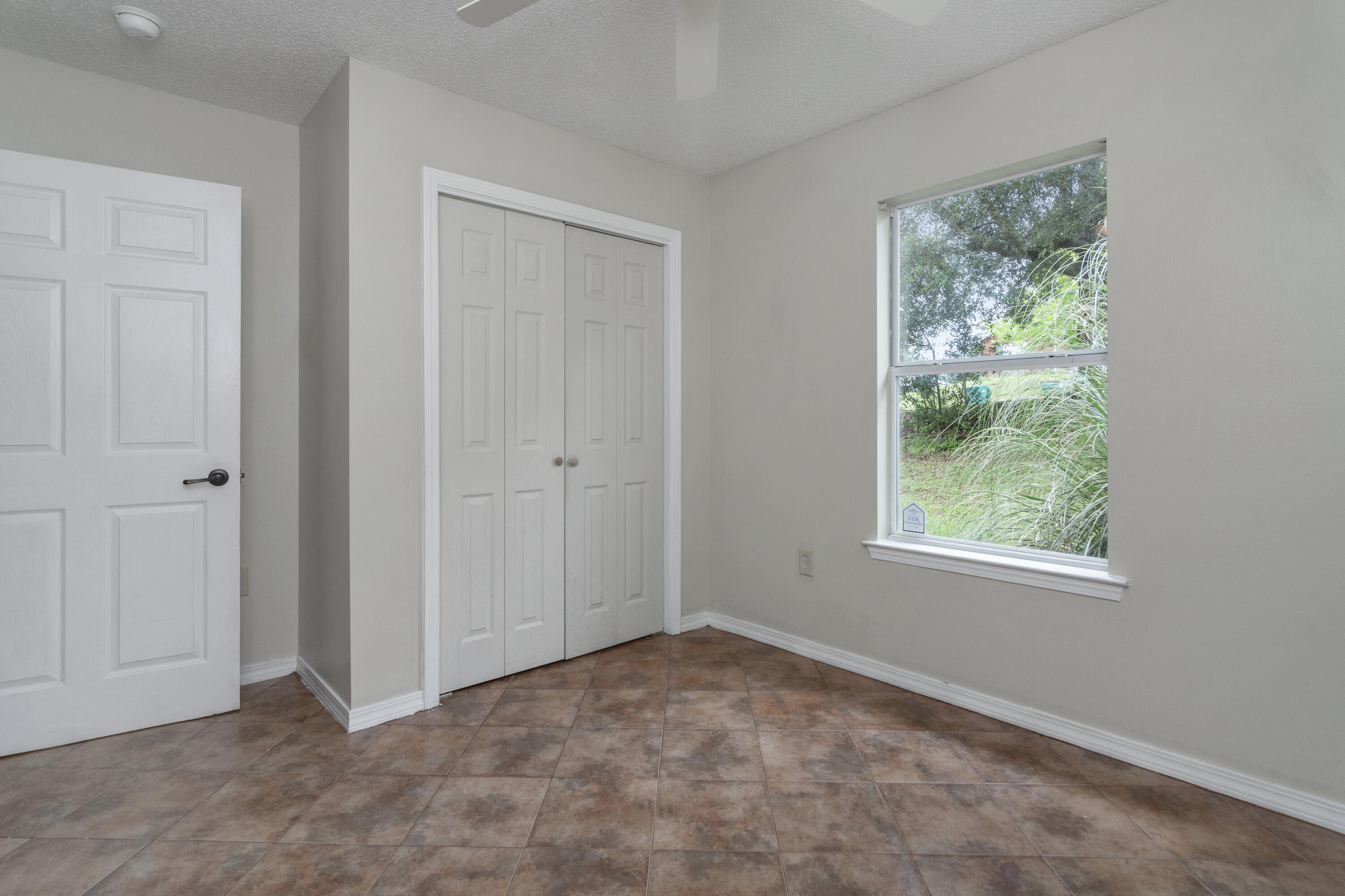 384 John King Road Crestview, FL 32539 - Photo 14 of 21 an empty room with windows