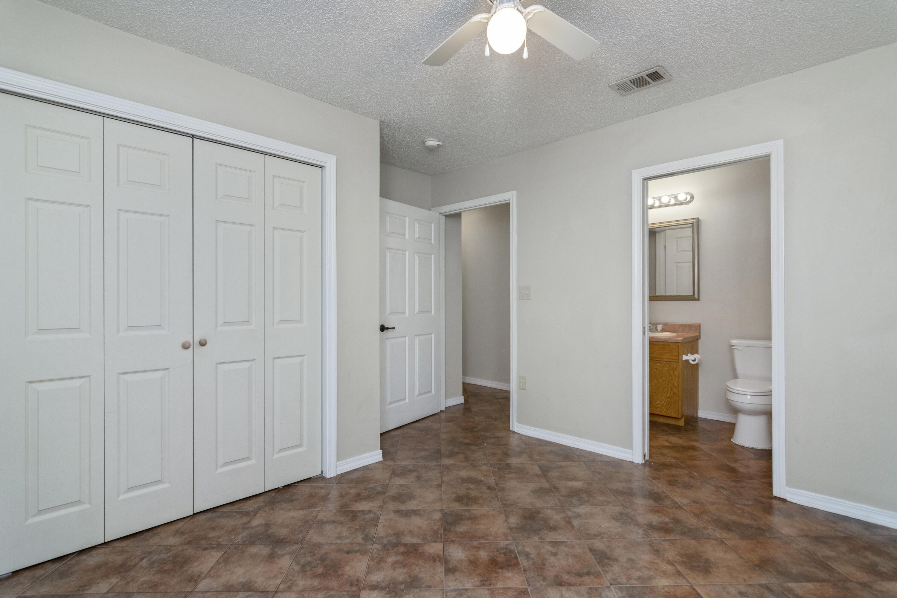 384 John King Road Crestview, FL 32539 - Photo 16 of 21 a view of an empty room and a bathroom