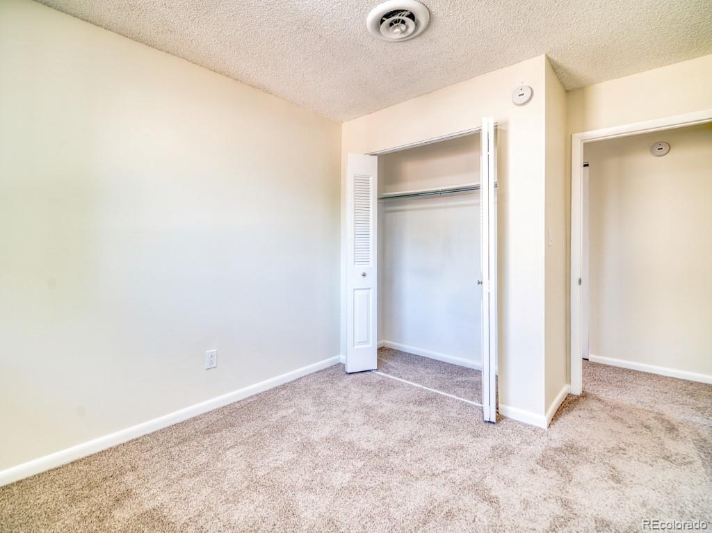 2730 West Mississippi Avenue, Unit 8 Denver, CO 80219 - Photo 27 of 40 a view of an empty room