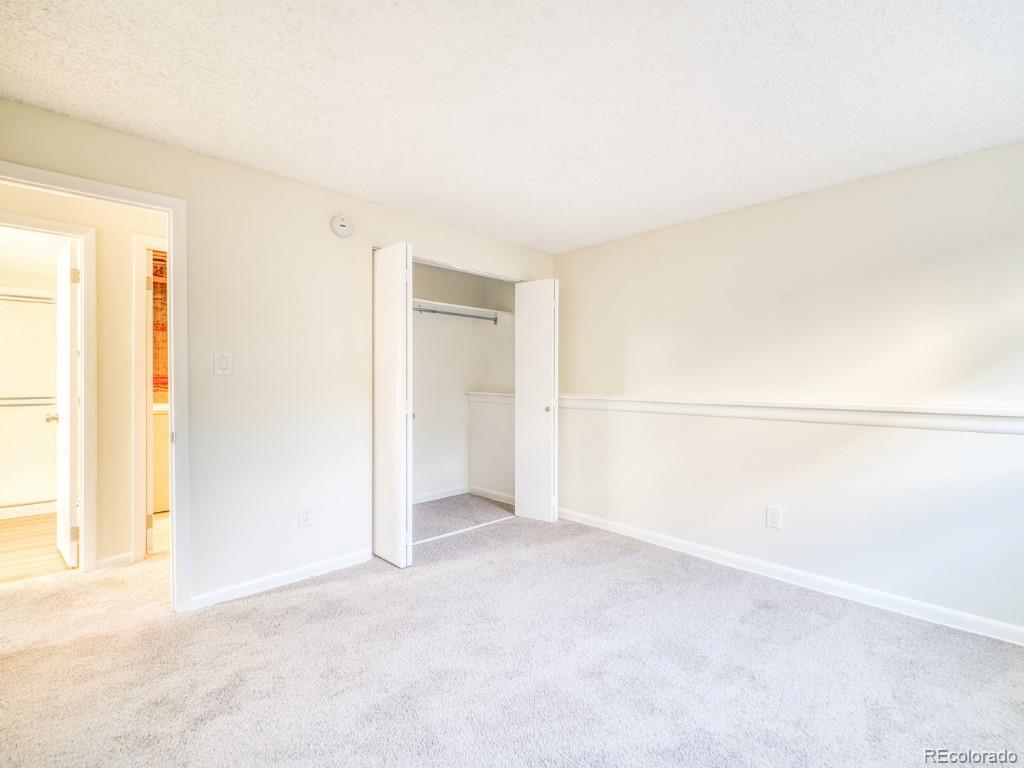 2730 West Mississippi Avenue, Unit 8 Denver, CO 80219 - Photo 28 of 40 a view of an empty room