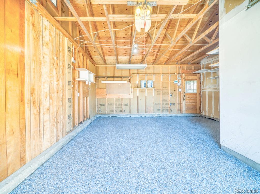 2730 West Mississippi Avenue, Unit 8 Denver, CO 80219 - Photo 32 of 40 a view of a room with wooden walls