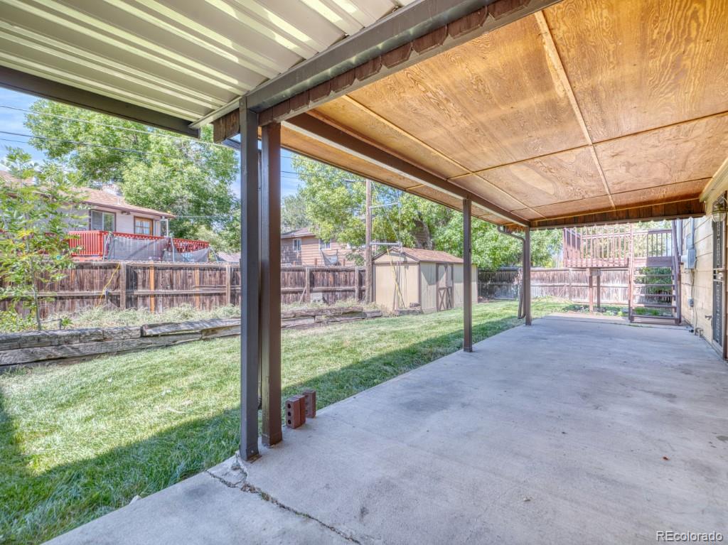2730 West Mississippi Avenue, Unit 8 Denver, CO 80219 - Photo 37 of 40 a view of a yard with porch and outdoor space