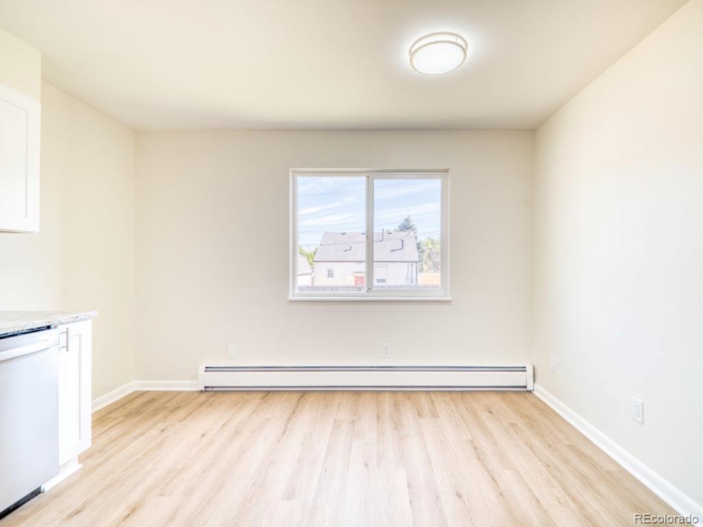 2730 West Mississippi Avenue, Unit 8 Denver, CO 80219 - Photo 7 of 40 a view of a room that has a window in it