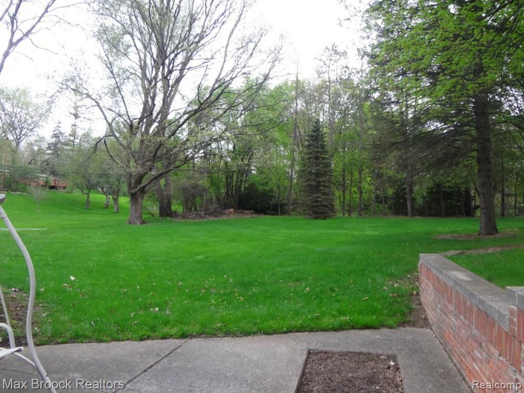 4740 West Maple Road Bloomfield Hills, MI 48301 - Photo 12 of 14 Backyard from Walkout