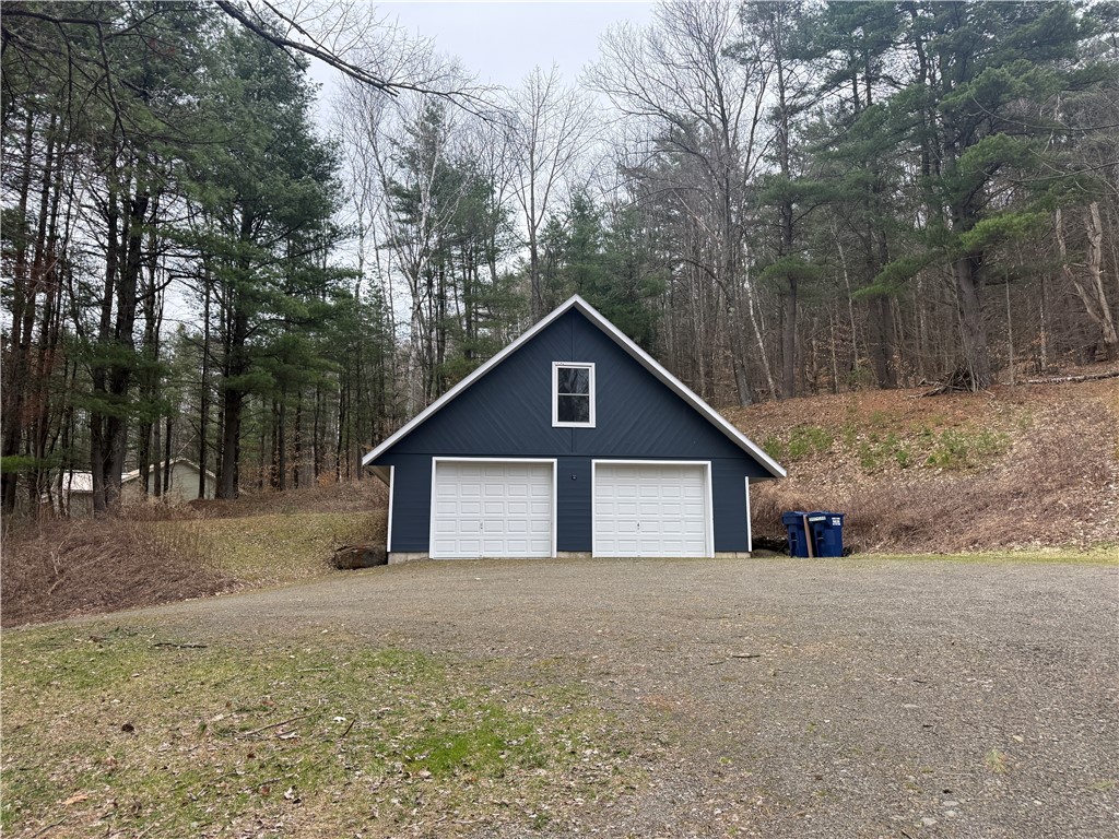 207 Pheasant Run Road Middlefield, NY 13326 - Photo 38 of 44 Oversized 2 car garage