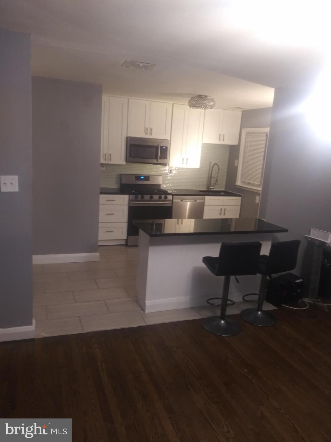 802 Stamford Road Baltimore, MD 21229 - Photo 3 of 8 Dining room + kitchen